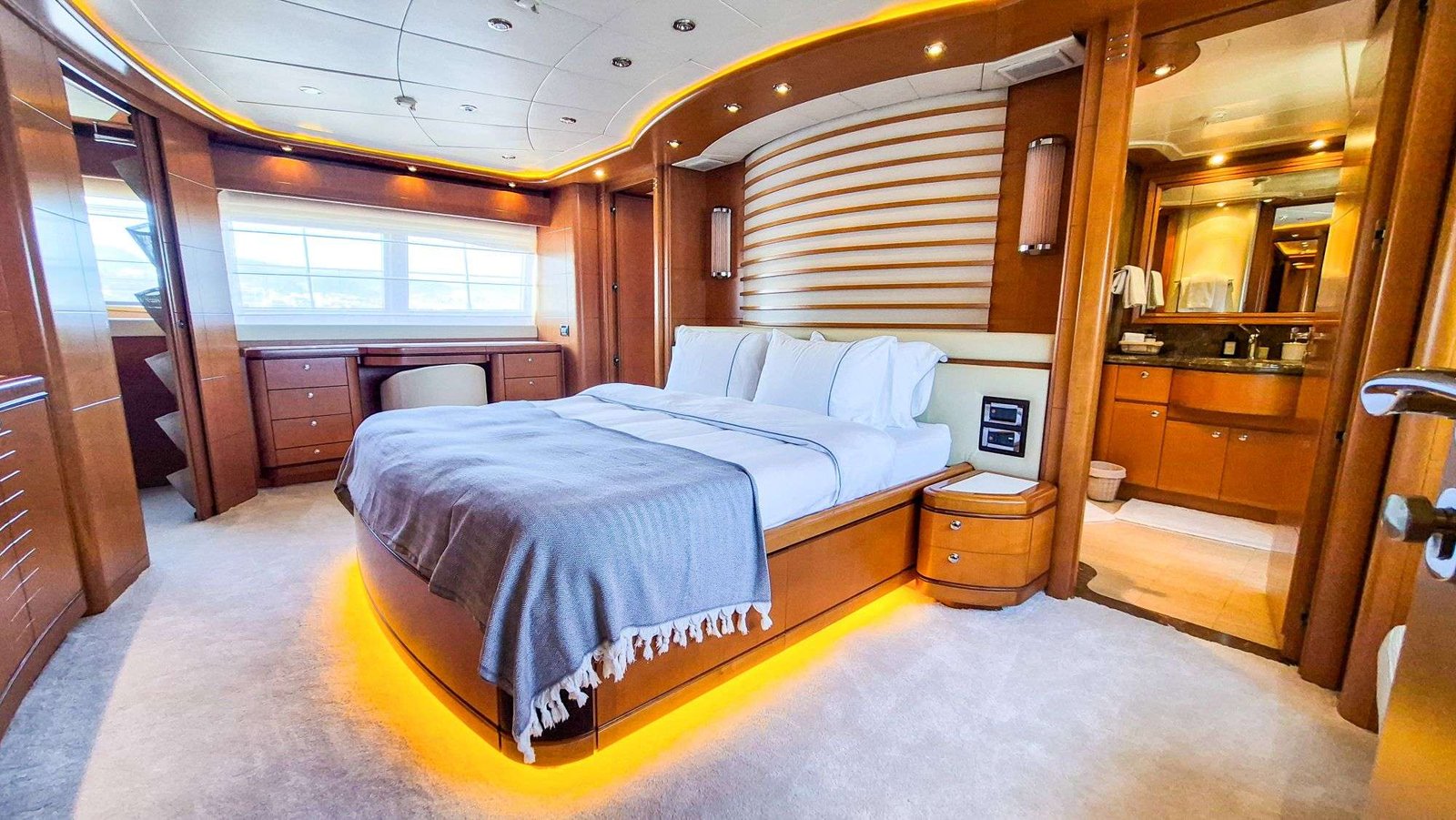 Full-beam master cabin with king bed aboard a 40m CRN superyacht charter — AR4004