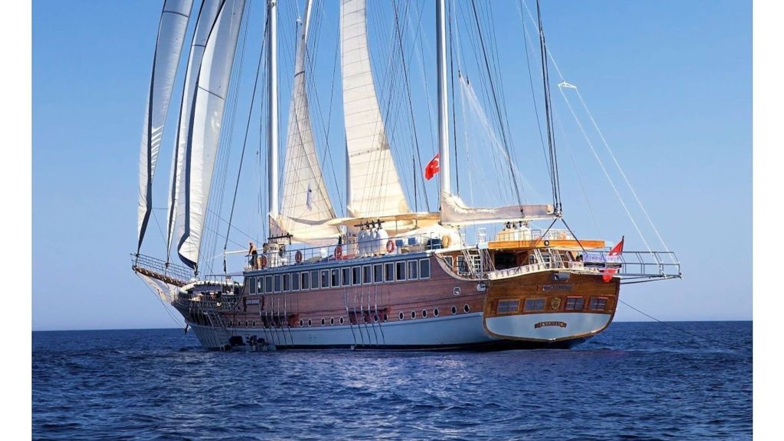Broadside profile of a 46m gulet charter Fethiye vessel under way