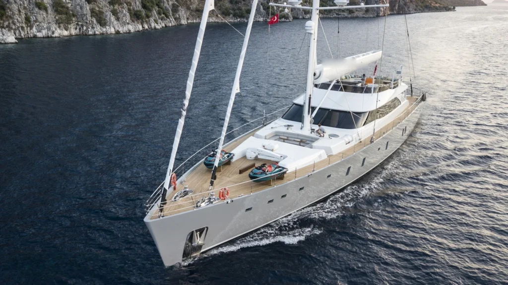 Aerial of a 50m motor sailer underway off Bodrum — crewed superyacht charter AA5019