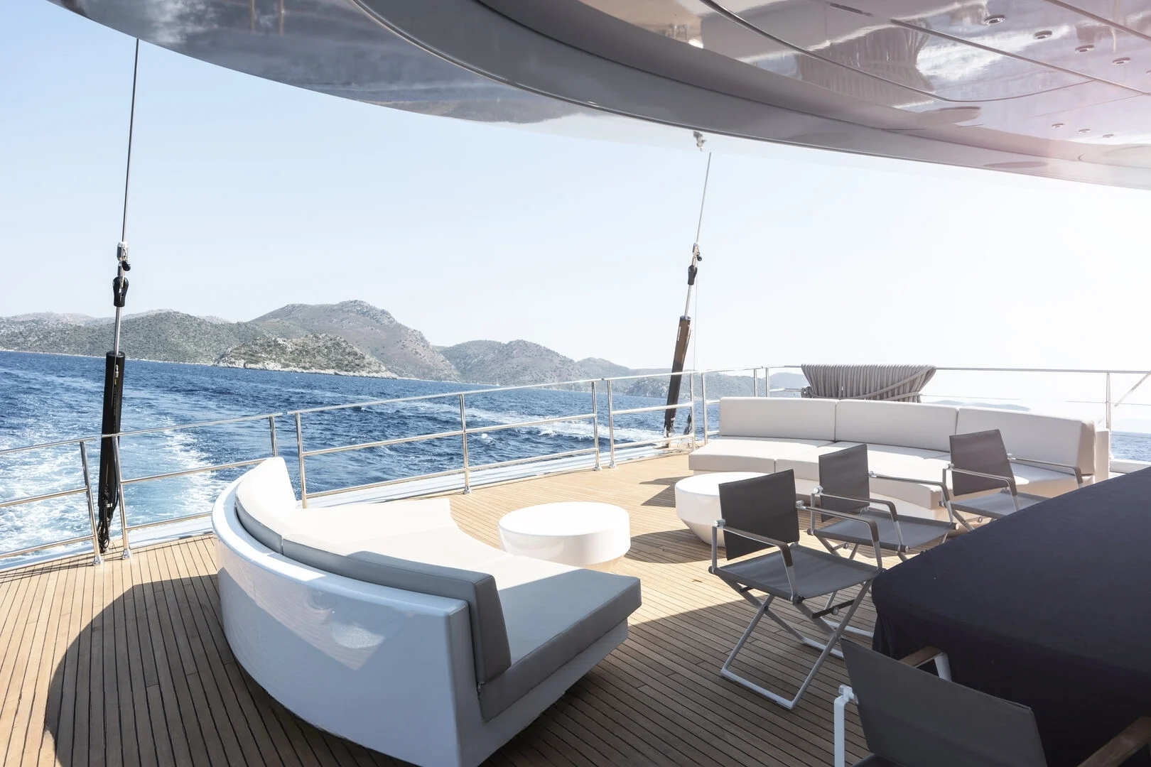 Aft deck seating underway aboard a 50m crewed superyacht charter Turkey — AA5019