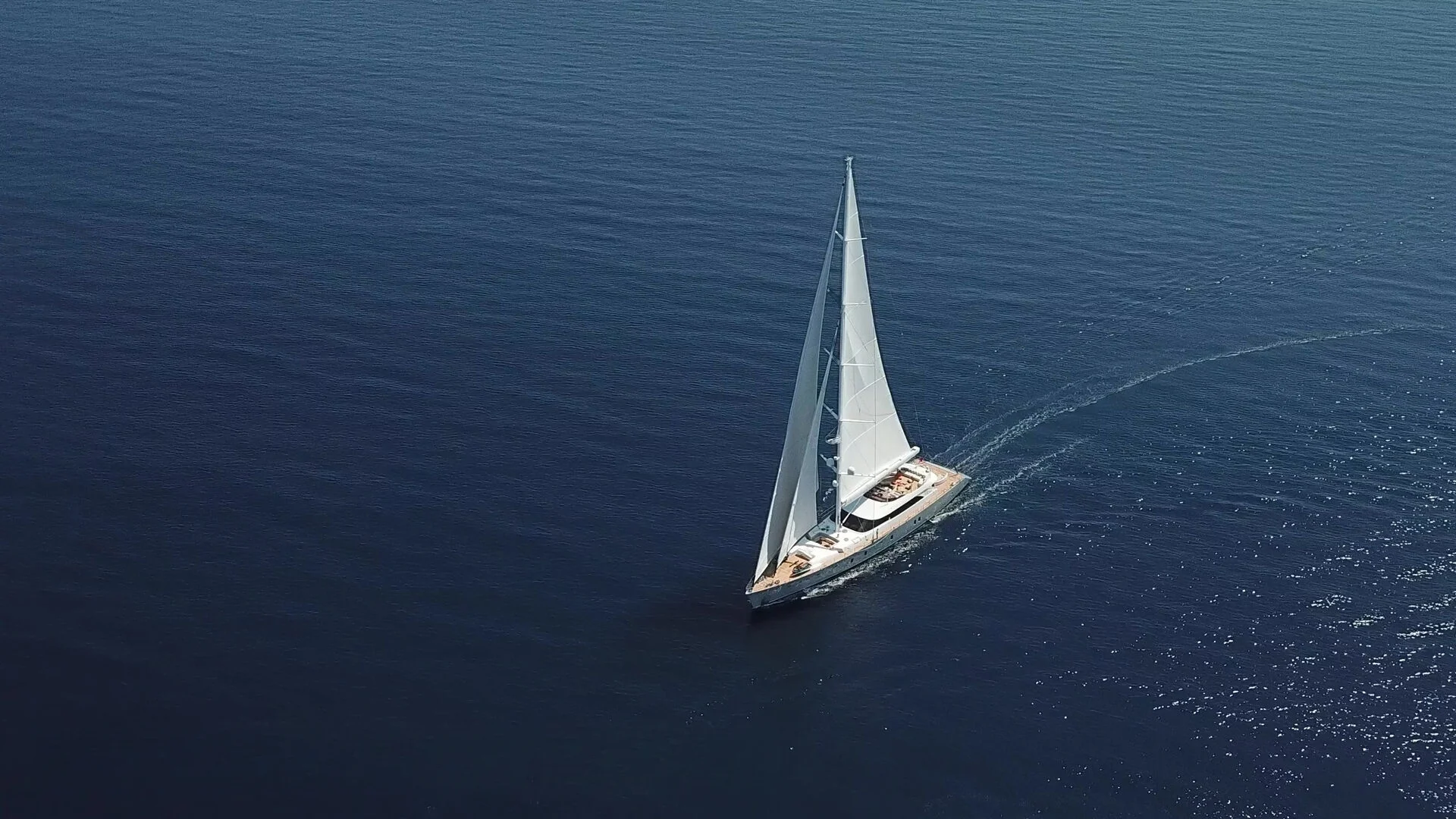 Aerial of a 50m motor sailer under full sail off Bodrum — AA5019