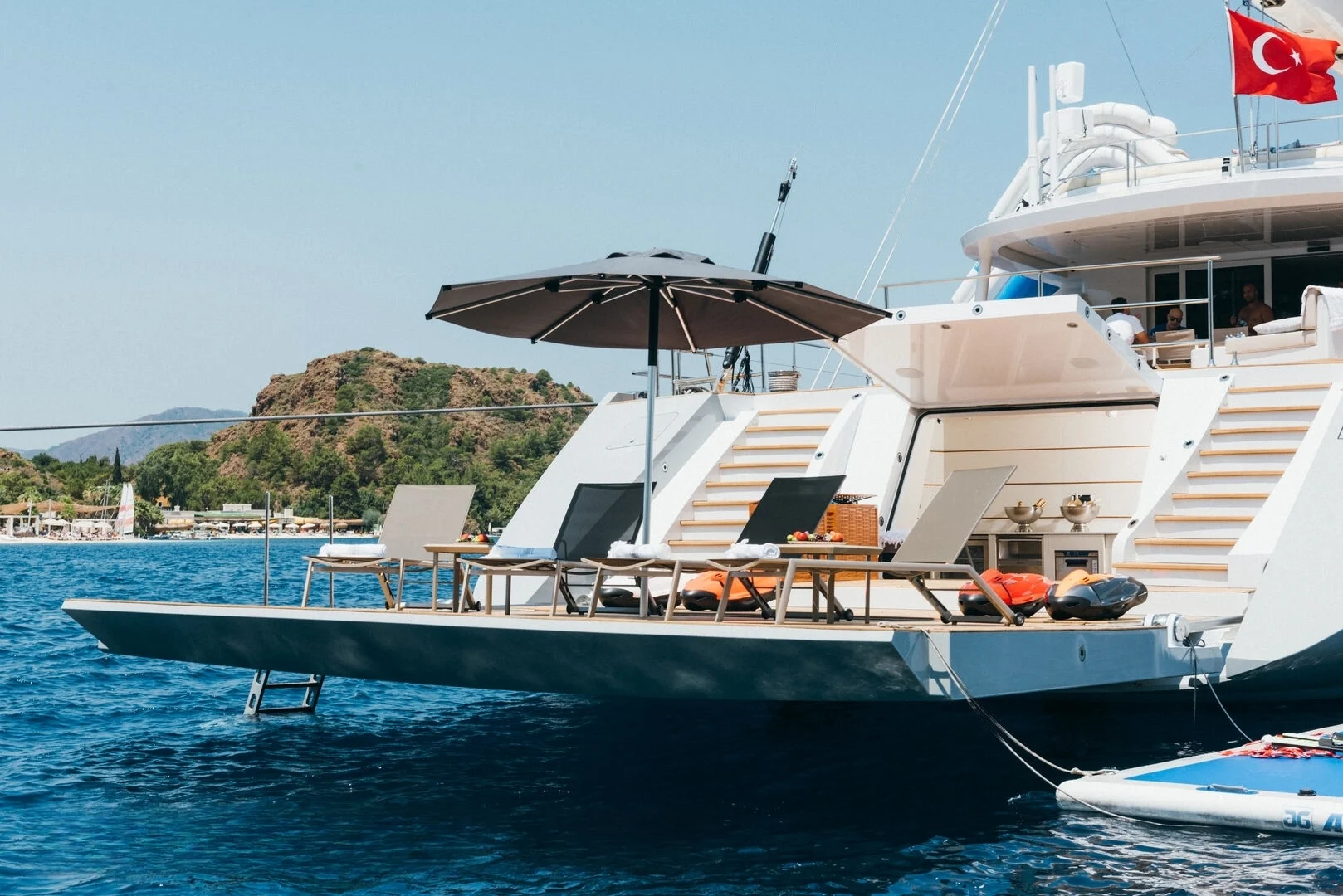 Aft deck sunbeds and water slide aboard a 50m motor sailer charter, Bodrum — AA5019