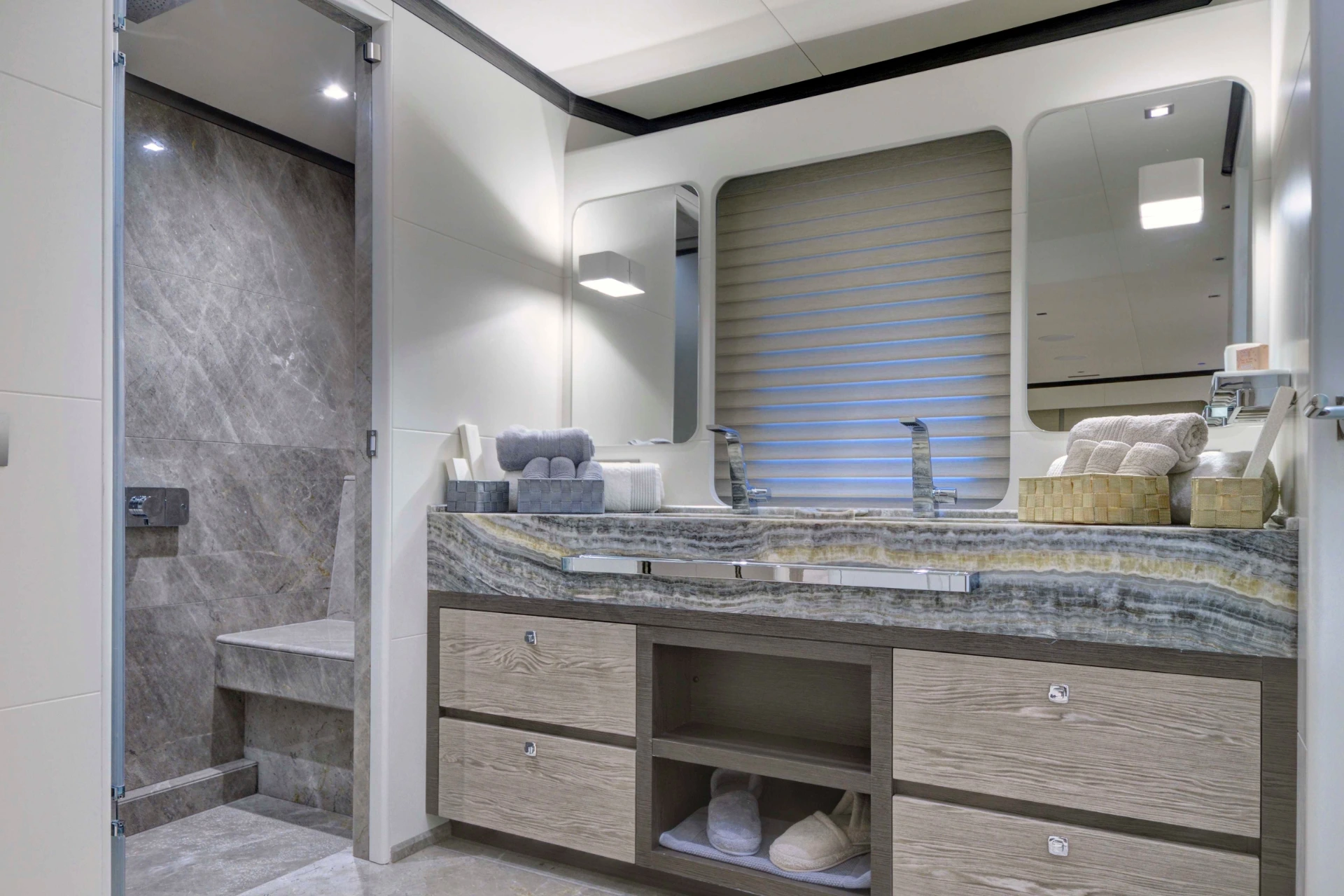 Master bathroom in marble with twin basins and walk-in shower, 50m superyacht charter — AA5019