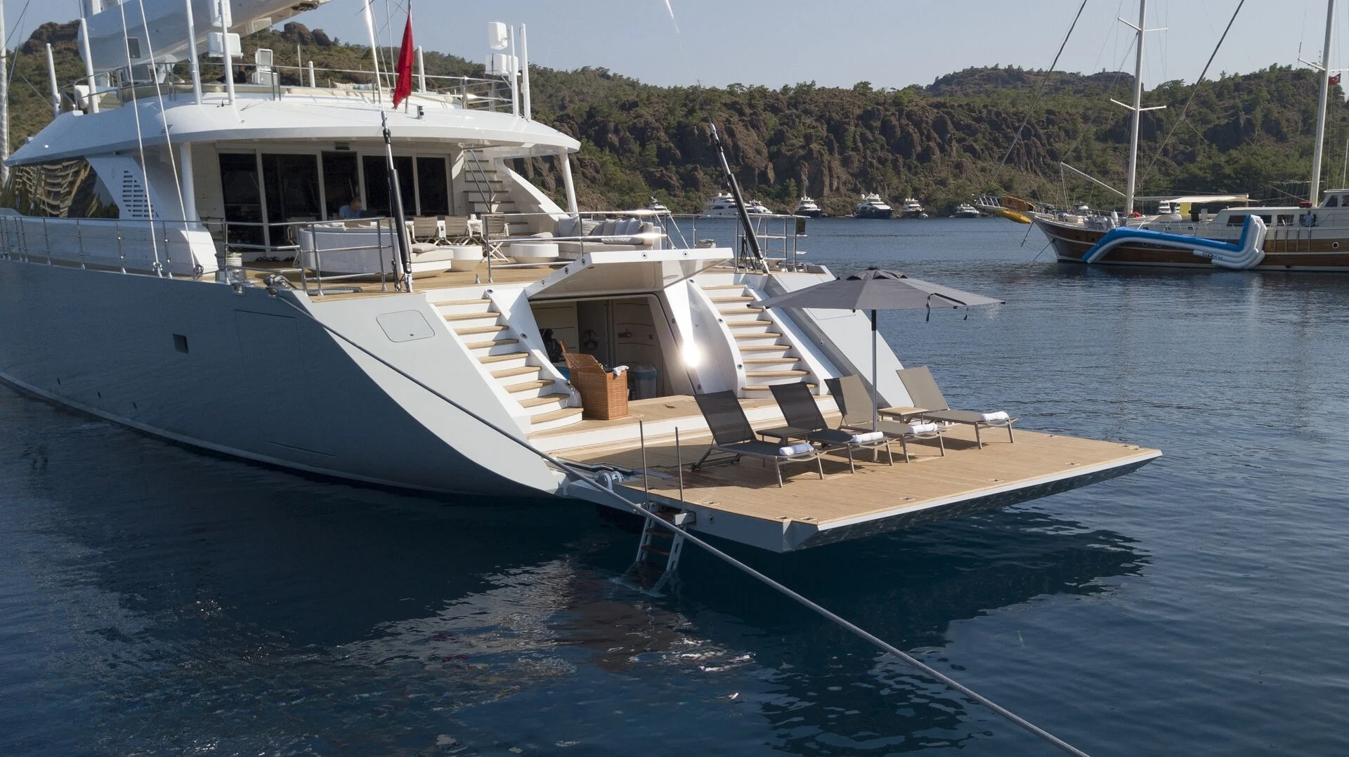 50m motor sailer moored stern-to with passerelle and loungers, Turkey — AA5019