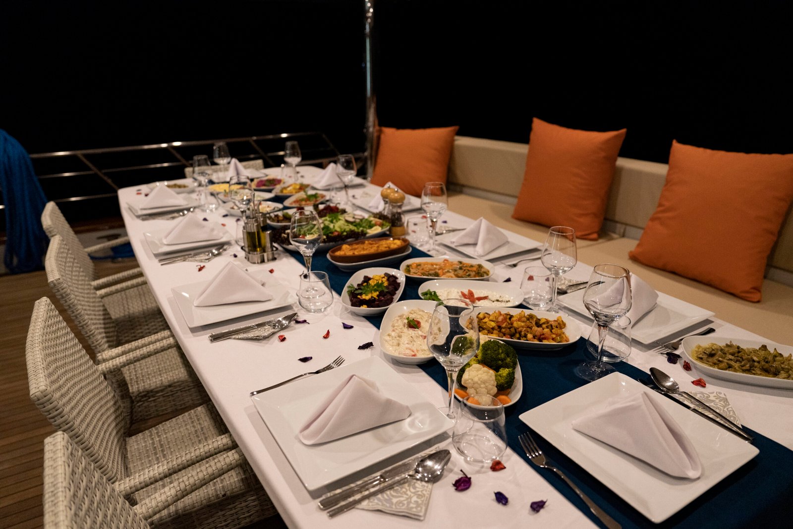 Shaded aft-deck dining aboard a deluxe trawler charter in Fethiye