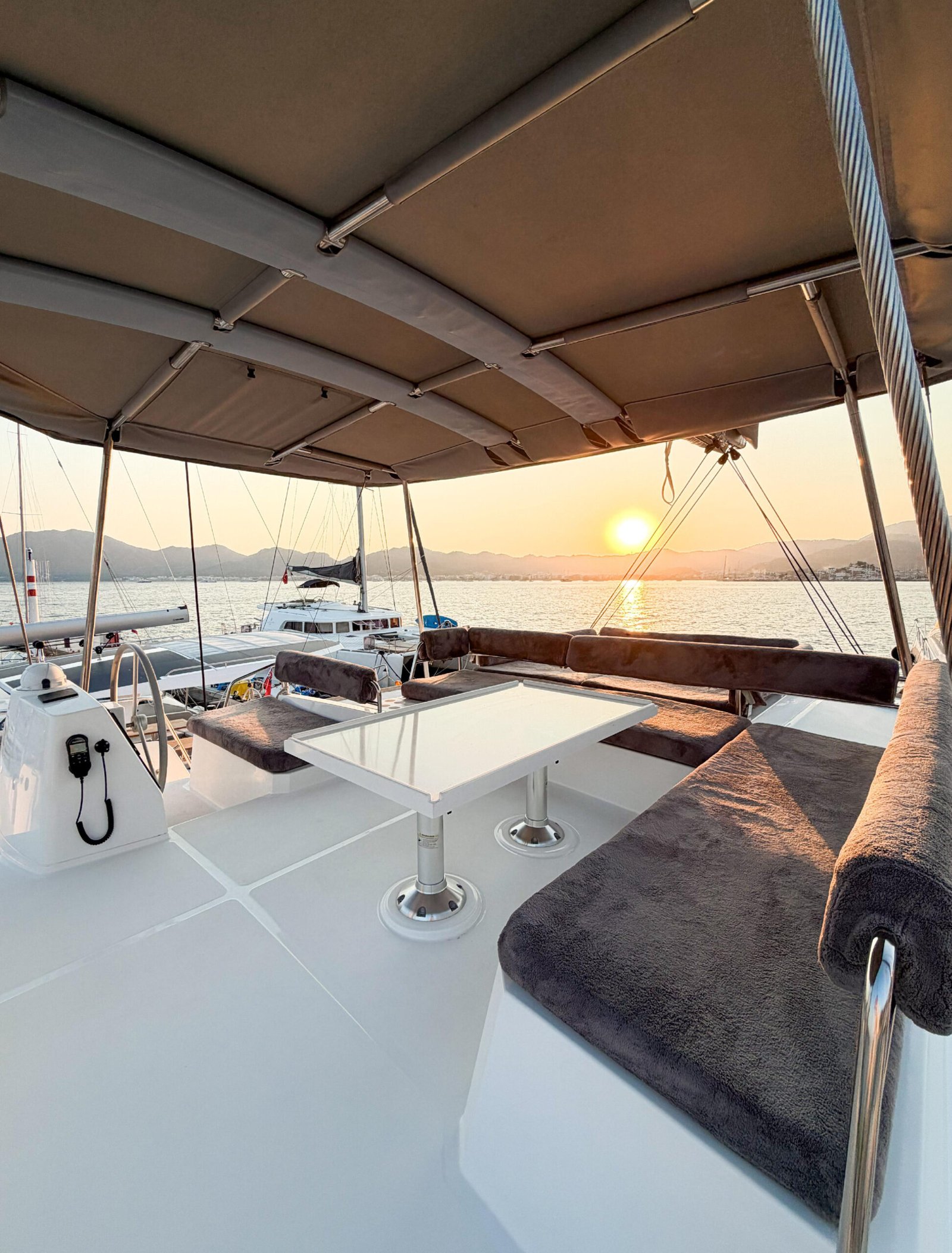Bali 4.8 catamaran charter Marmaris: LU1526 cockpit at sunset