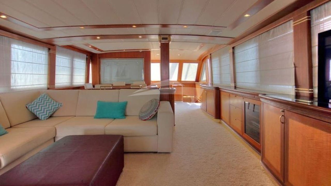 Main saloon with mahogany joinery aboard a crewed yacht charter in Bodrum