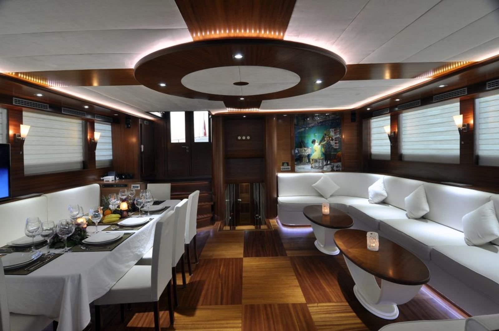 Saloon dining table and lounge aboard a deluxe gulet charter in Turkey