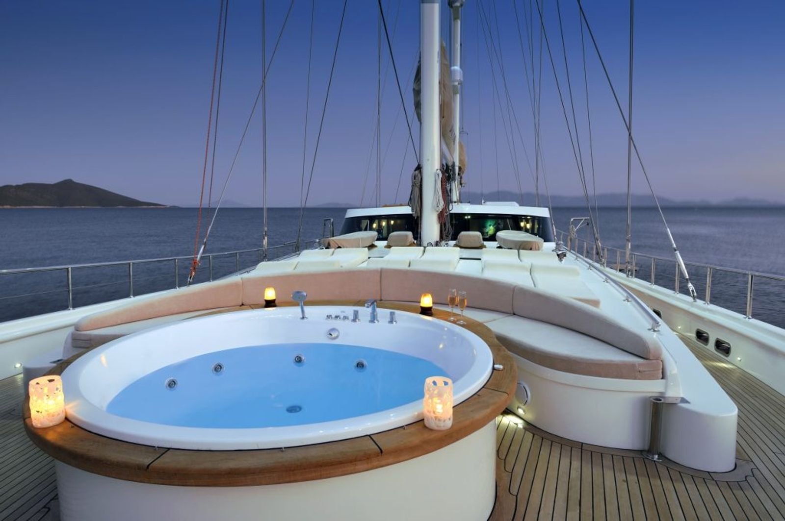 Foredeck jacuzzi lit at dusk aboard a 36m deluxe gulet in Turkey