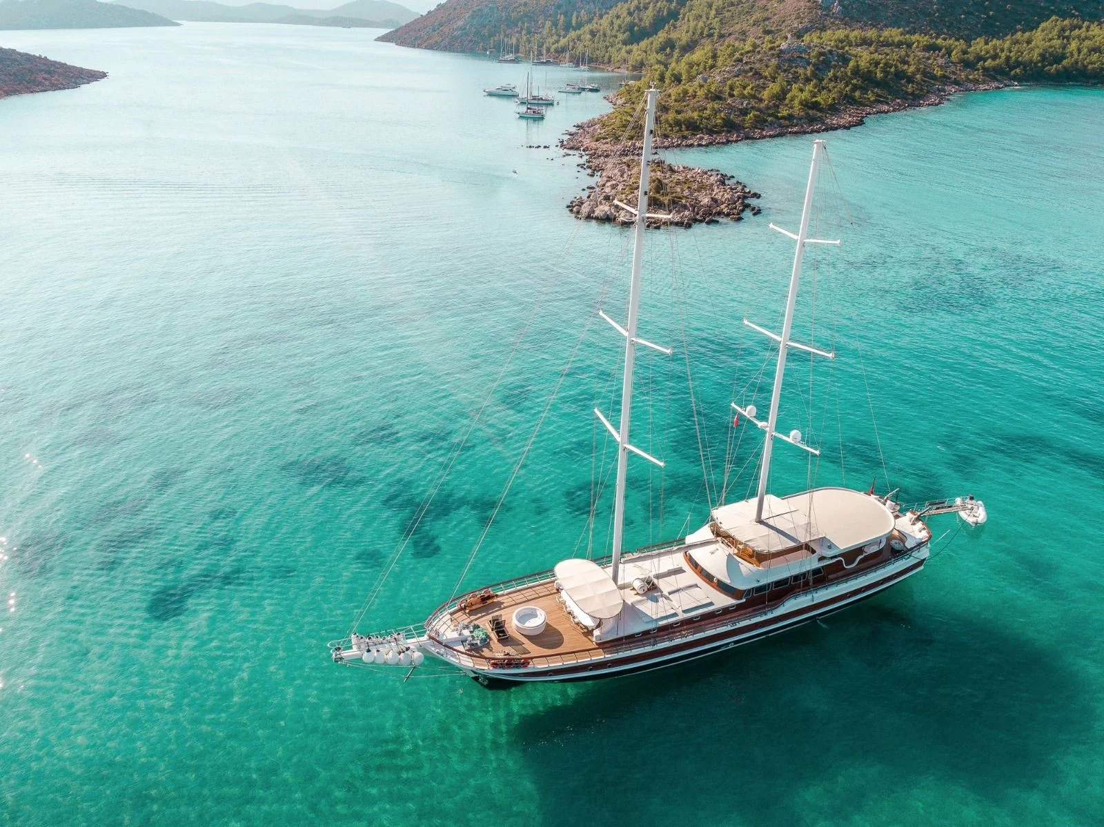 Aerial of a 42m gulet anchored in a sheltered cove near Marmaris — HM4218