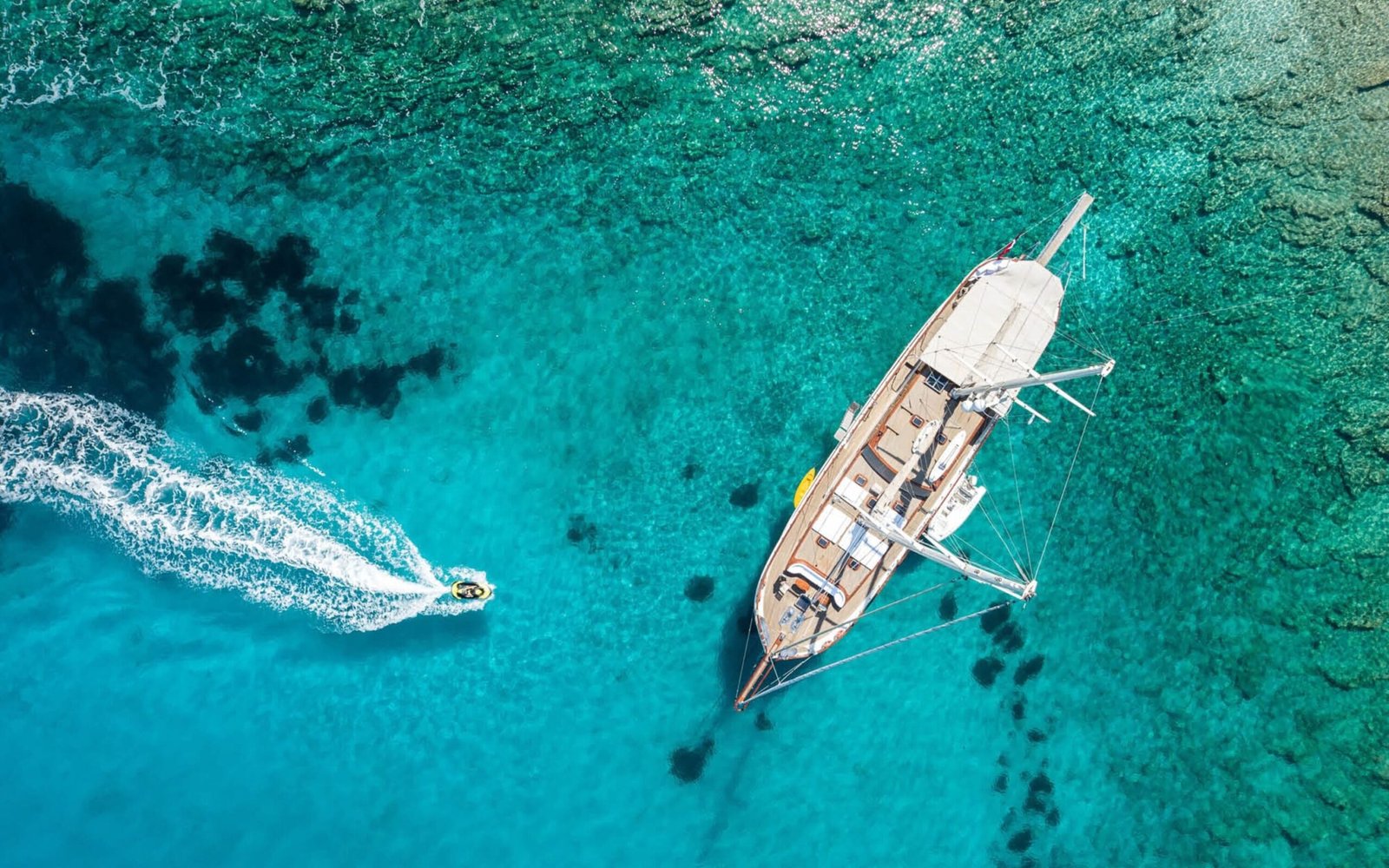 Aerial of a 30m gulet with her tender underway, Turkish Riviera — ED3011