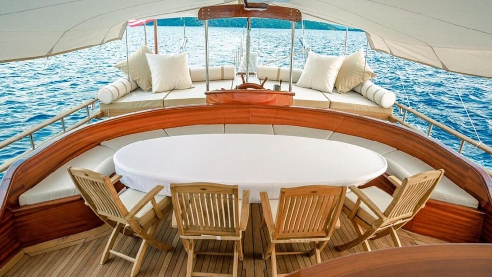 Round aft deck dining table on a traditional gulet charter Bodrum yacht