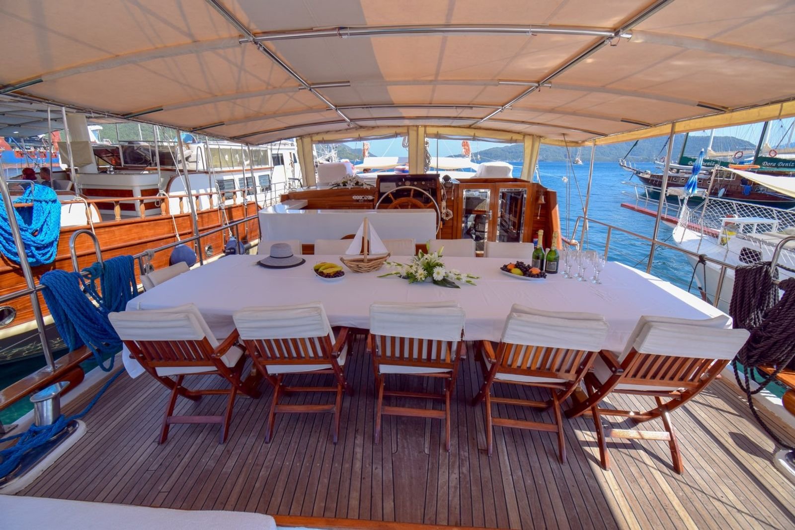 Aft deck table laid for sixteen on a gulet charter Marmaris yacht