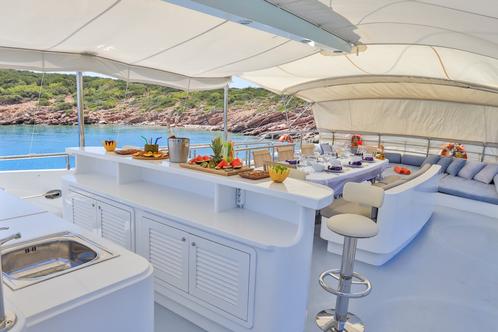 Deck bar set for breakfast aboard a 37m crewed gulet charter, Bodrum — CA3713