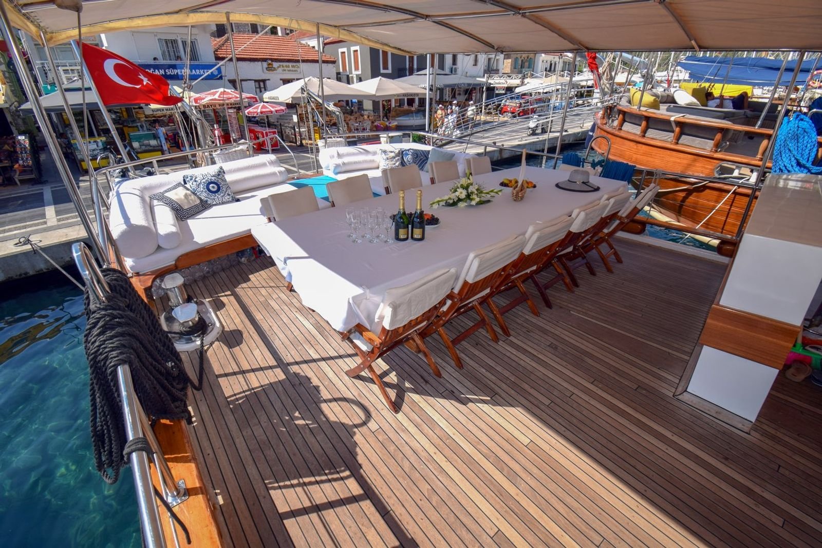 Deck table laid for a large group on a gulet charter Marmaris yacht