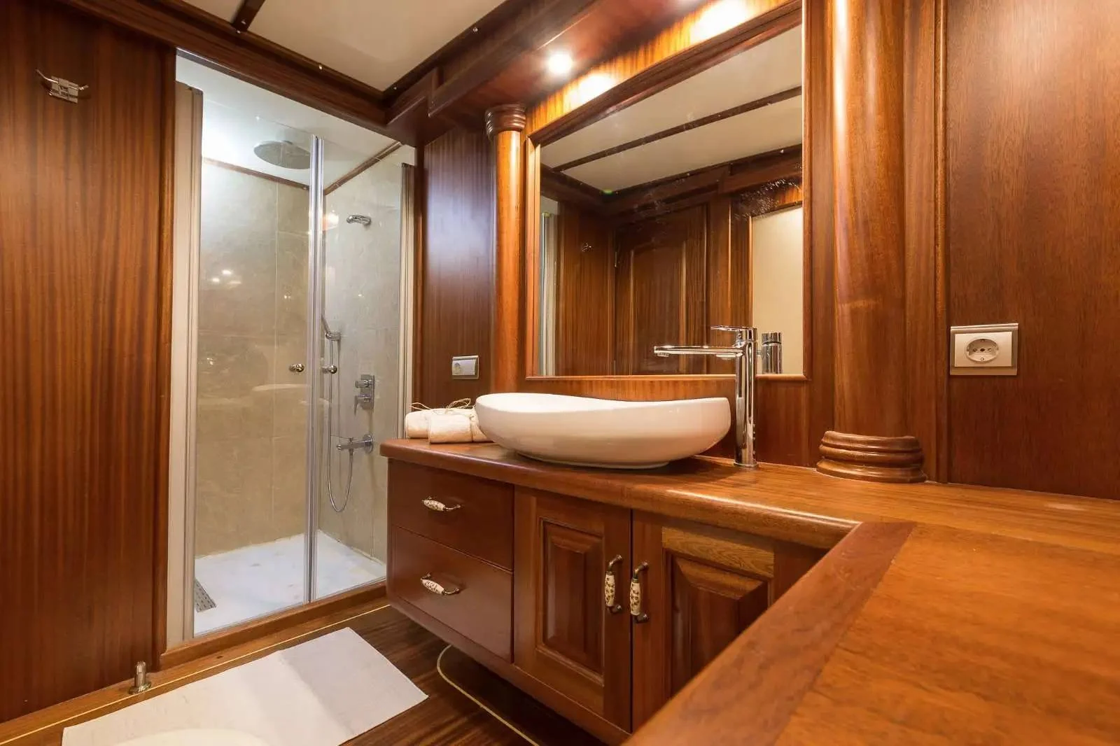 En-suite bathroom with shower aboard a 42m gulet charter Marmaris — HM4218