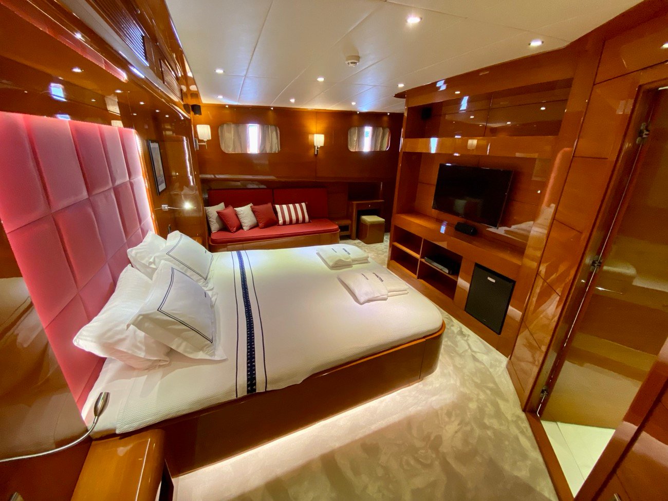 Master suite with lounge seating aboard a 37m gulet charter in Bodrum — CA3713