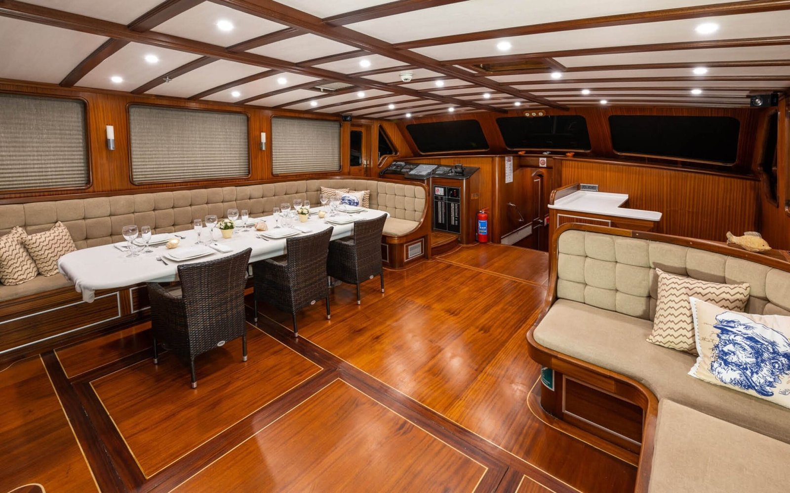 Saloon banquette and dining table aboard a 30m gulet charter, Bodrum — ED3011