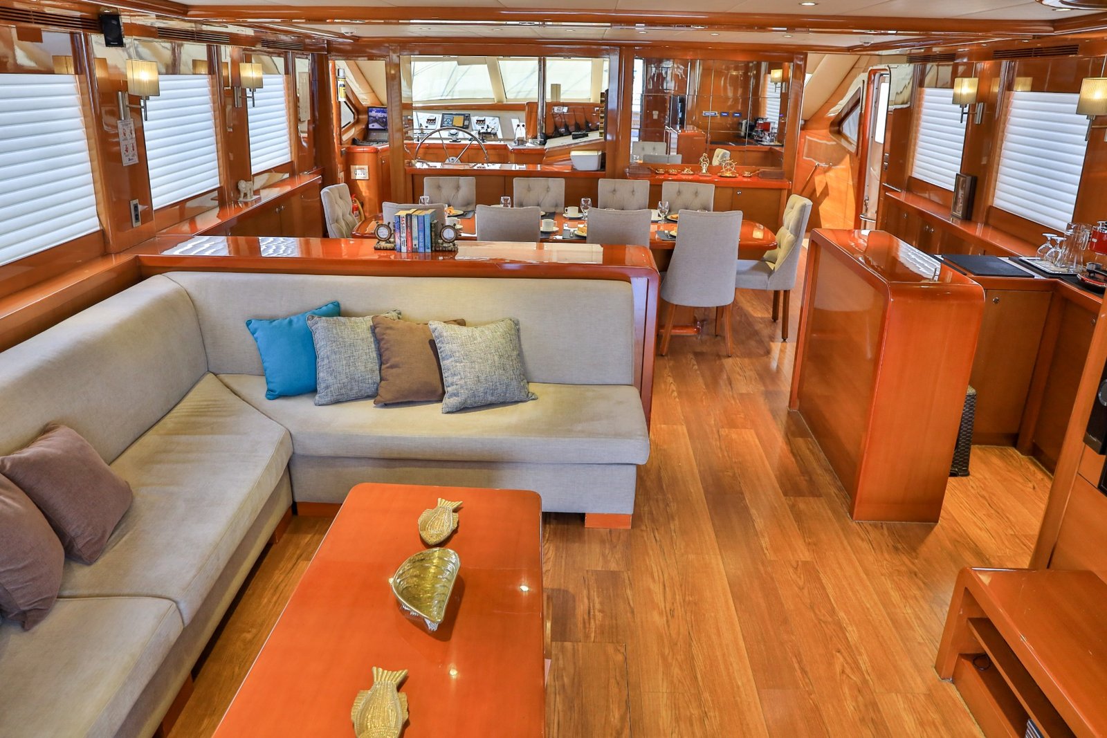 Saloon seating in polished mahogany aboard a 37m gulet charter — CA3713