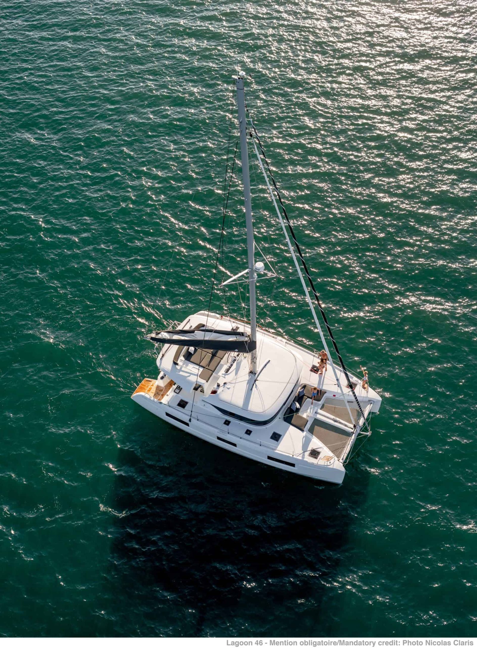 Lagoon 46 catamaran charter Gocek seen from directly above at anchor in clear green water