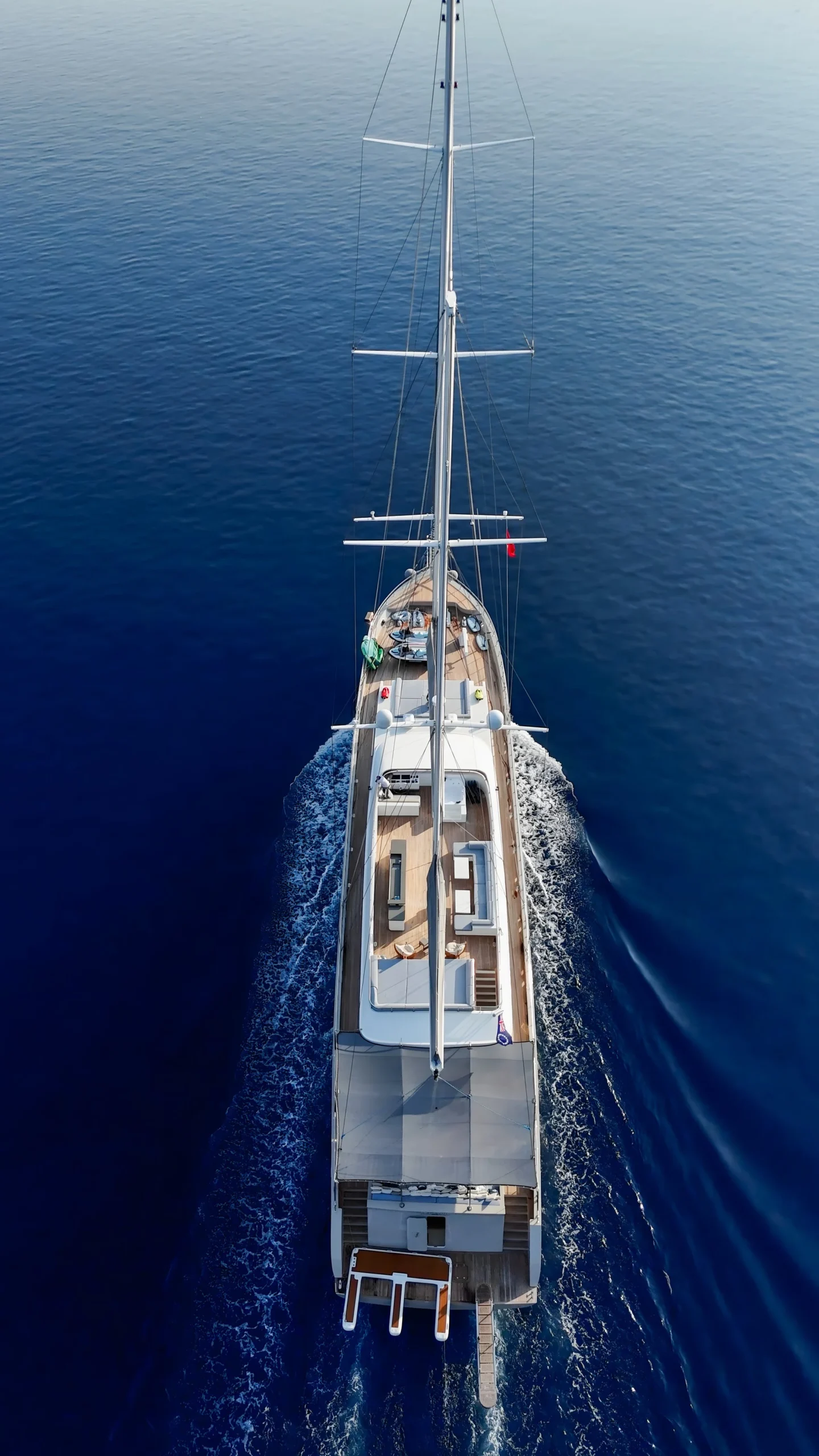 Aerial view of 50 metre sailing yacht DL5024 cruising under power