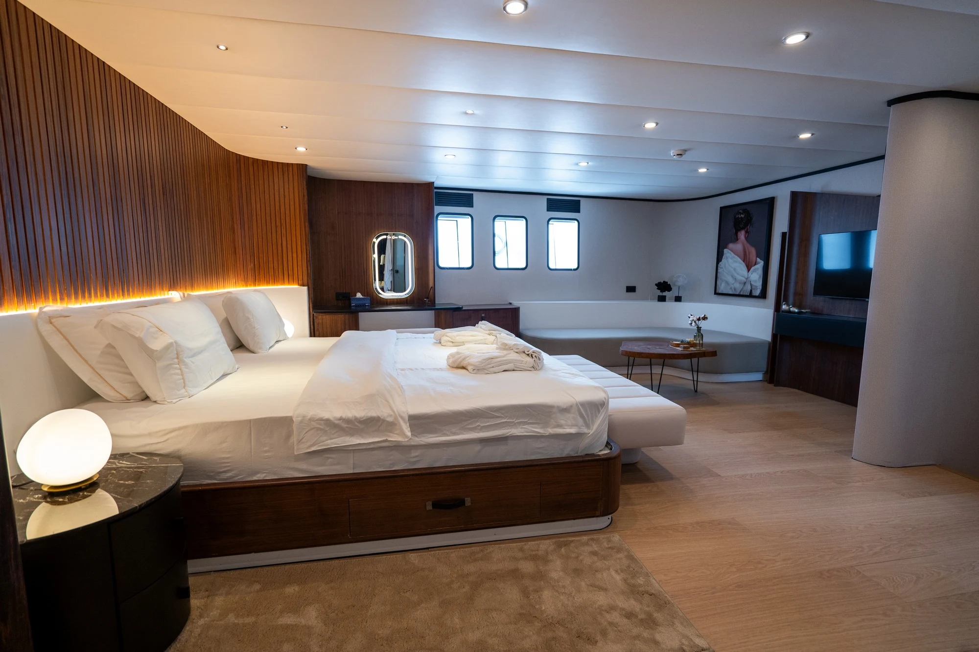 Master suite of DL5024 with wraparound windows and warm oak panelling