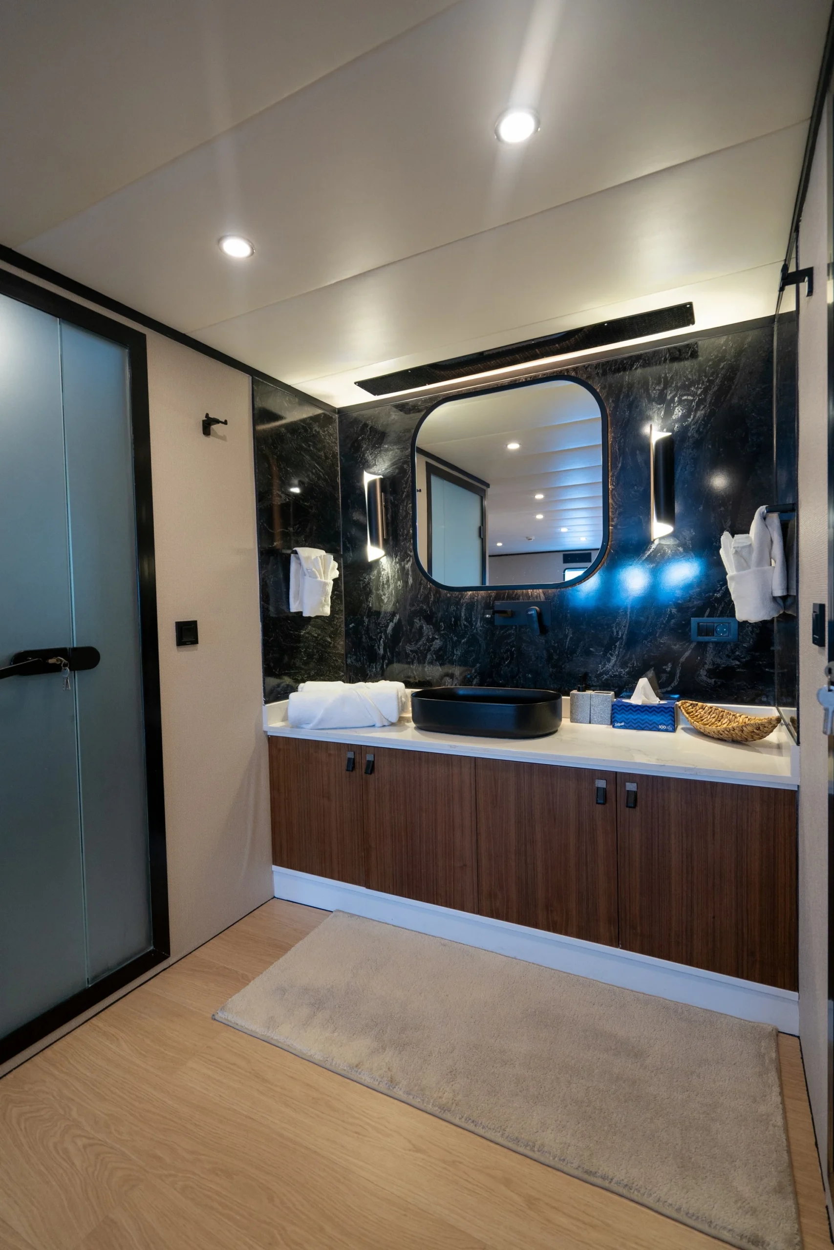 Master ensuite bathroom of DL5024 with black marble finishes