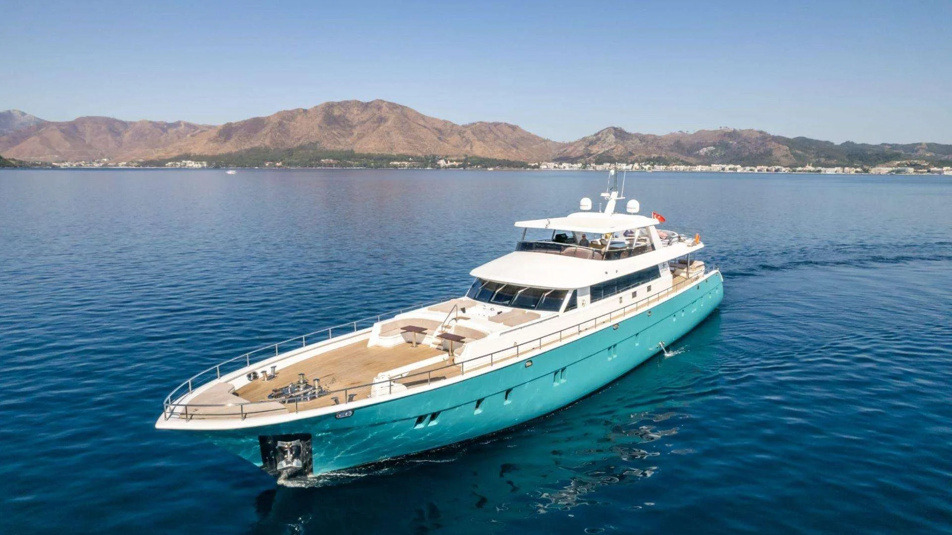 Aerial bow view of a luxury yacht charter Marmaris motor yacht anchored off the Marmaris coast