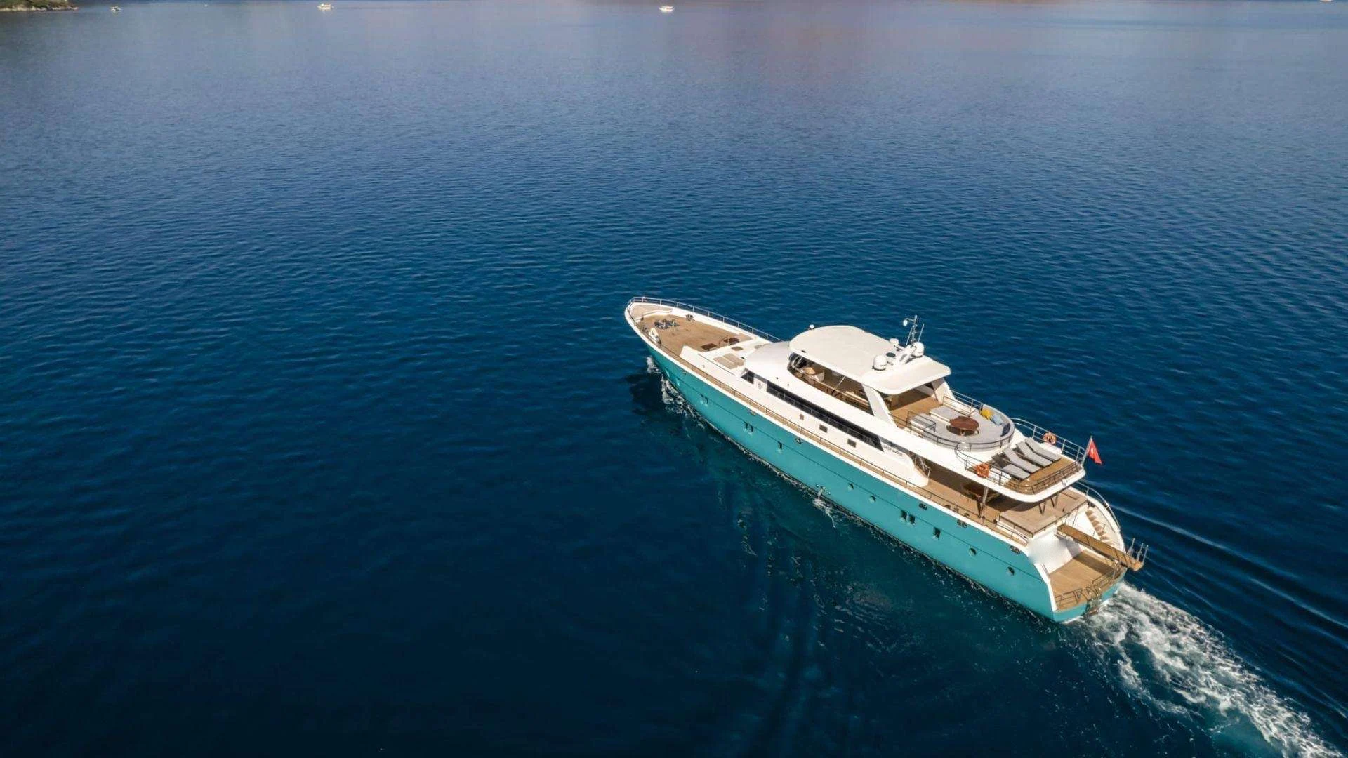 Aerial profile of a 39m crewed motor yacht available for luxury yacht charter Marmaris