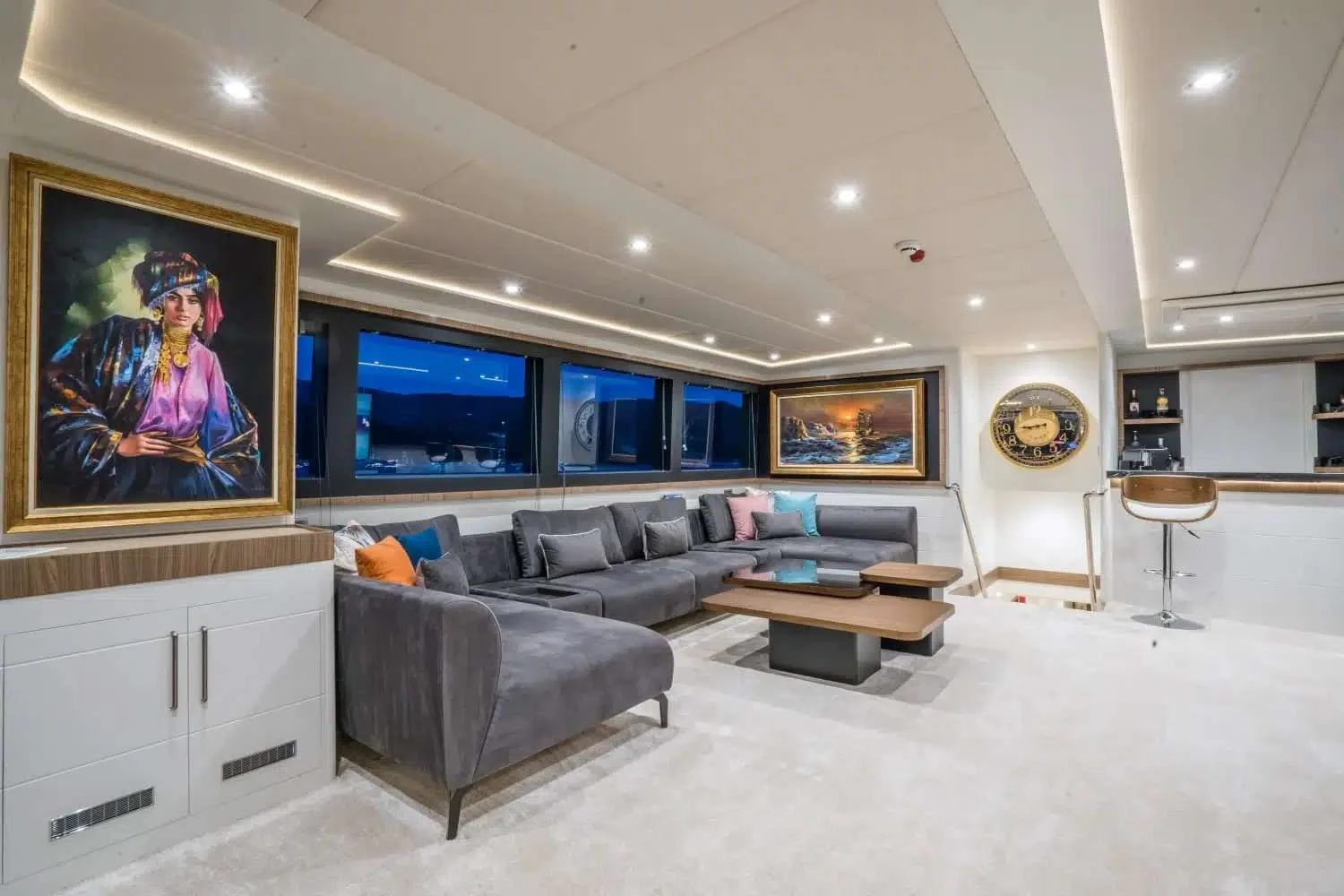 Main saloon with commissioned artwork and bar on a luxury yacht charter Marmaris motor yacht