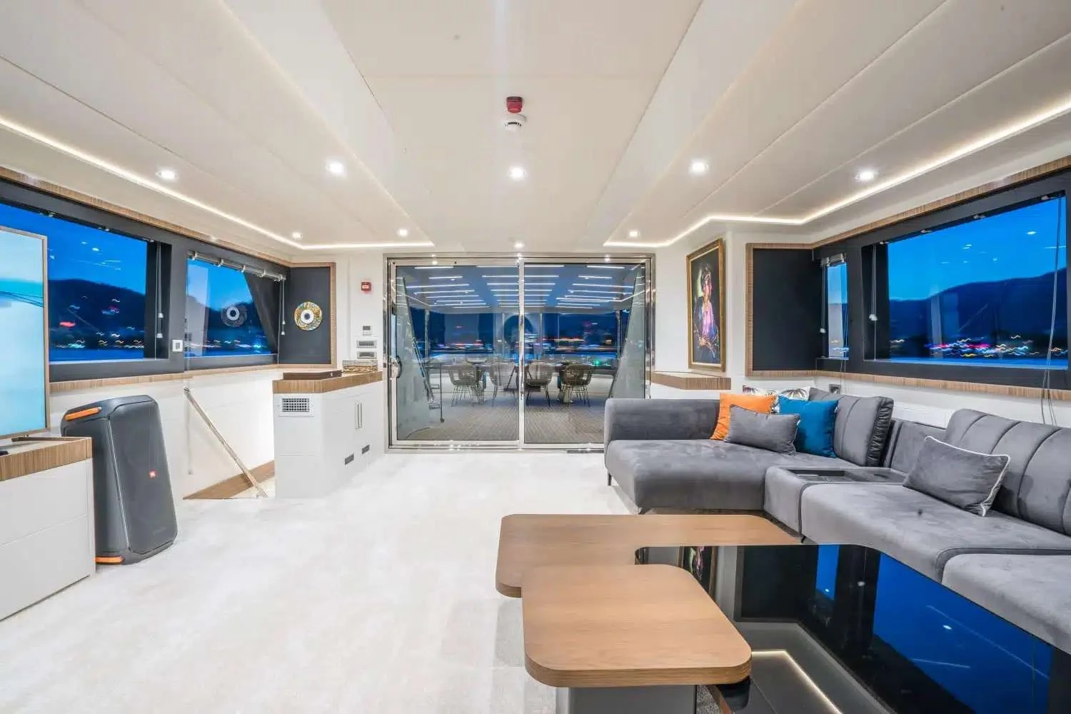 Full-beam main saloon looking aft on a luxury yacht charter Marmaris motor yacht