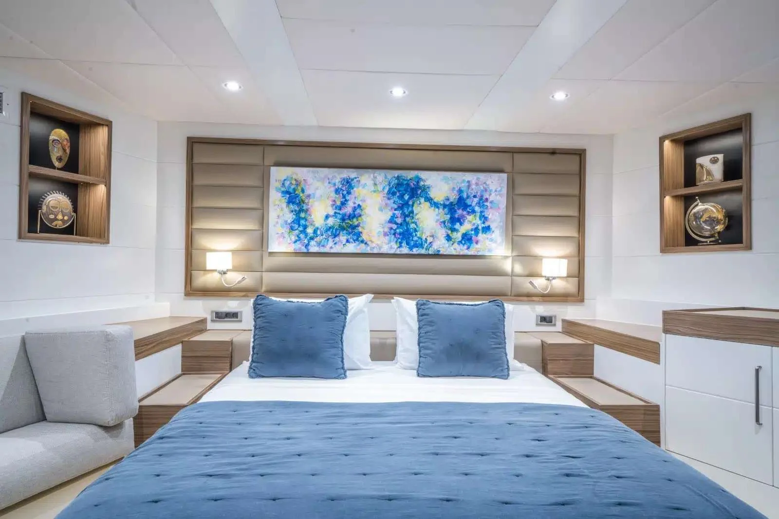 Double guest cabin with commissioned artwork aboard a luxury yacht charter Marmaris motor yacht