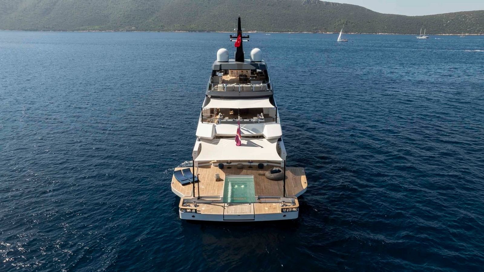 Stern and plunge pool of a 50m mega yacht charter in Bodrum