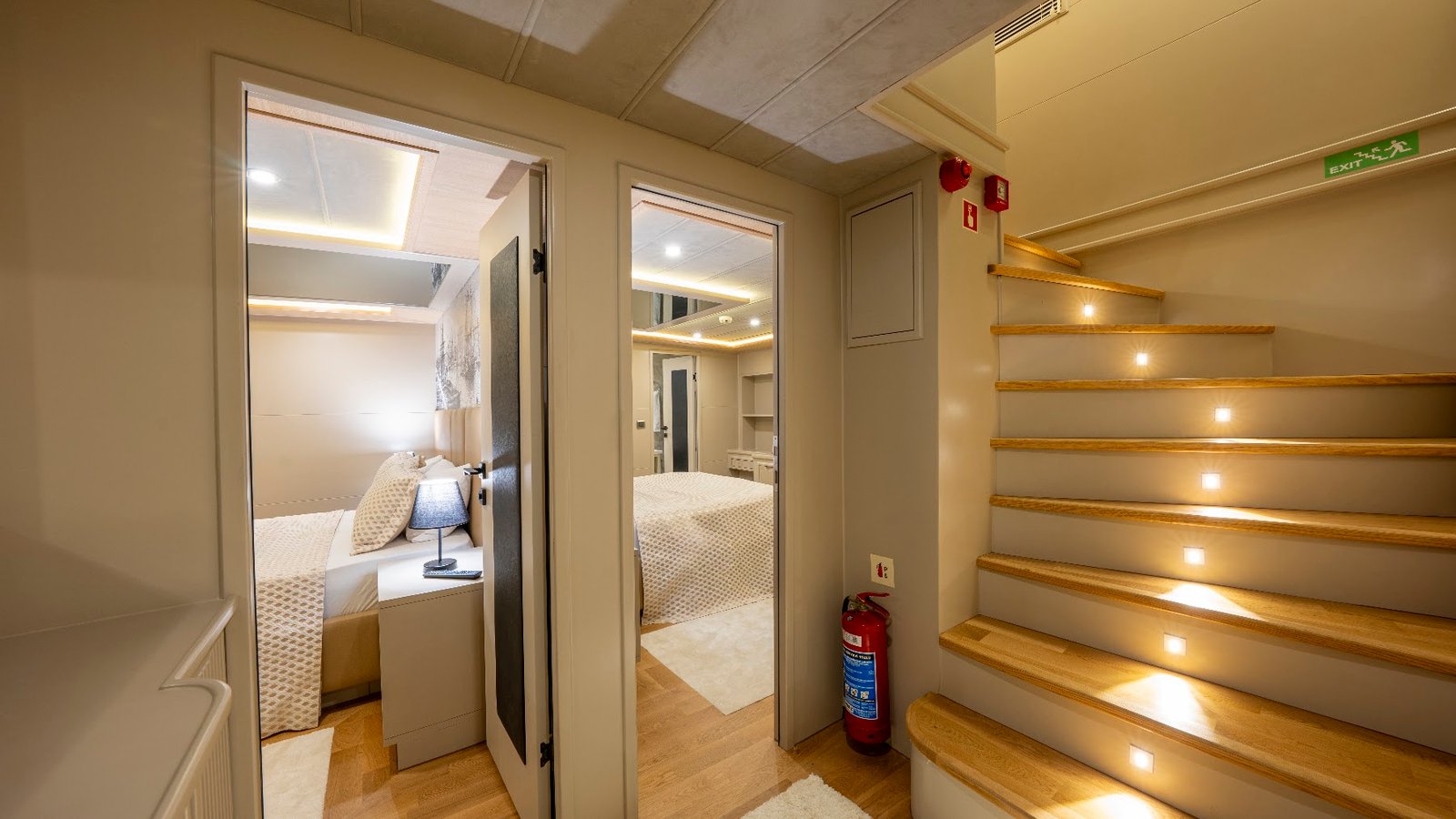 Interior staircase and guest hallway aboard luxury trawler charter Fethiye SF2615