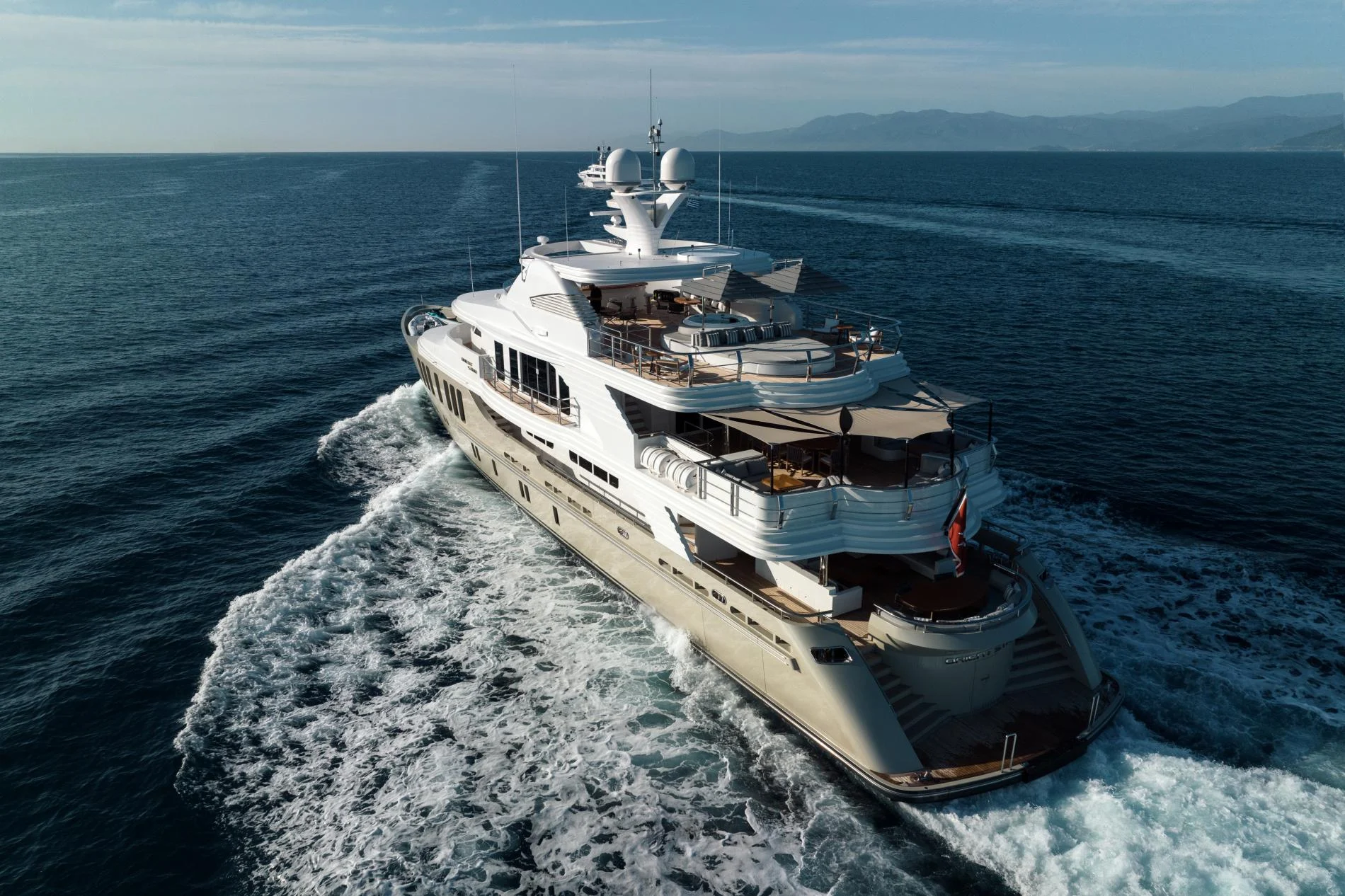 Aerial quarter view of a 47m superyacht underway, Turkish Riviera charter — OS4712