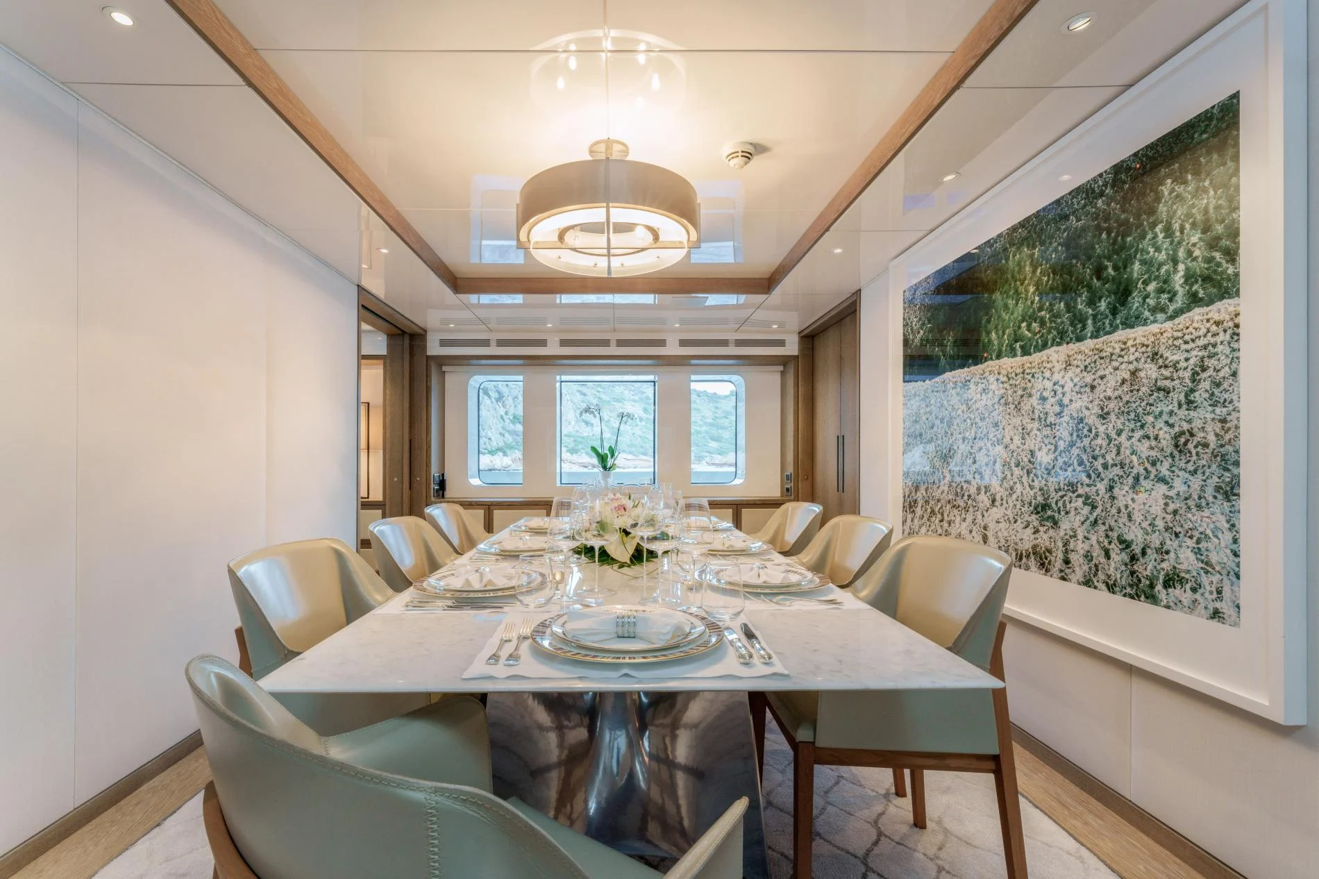 Formal dining room with marble table aboard a 47m luxury superyacht charter — OS4712