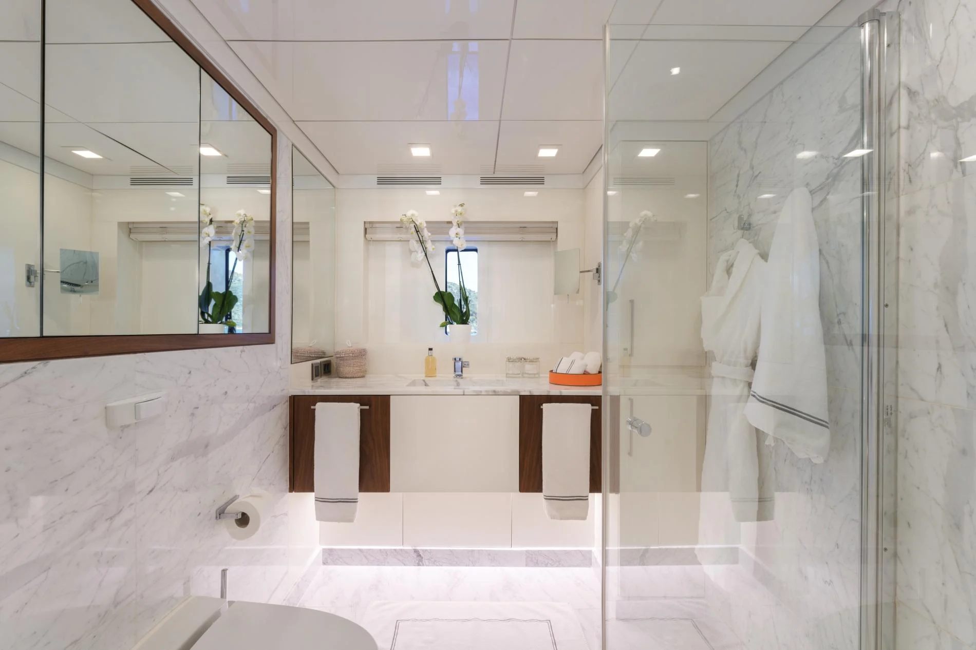 Marble en-suite with bath and separate shower aboard a 47m superyacht charter — OS4712