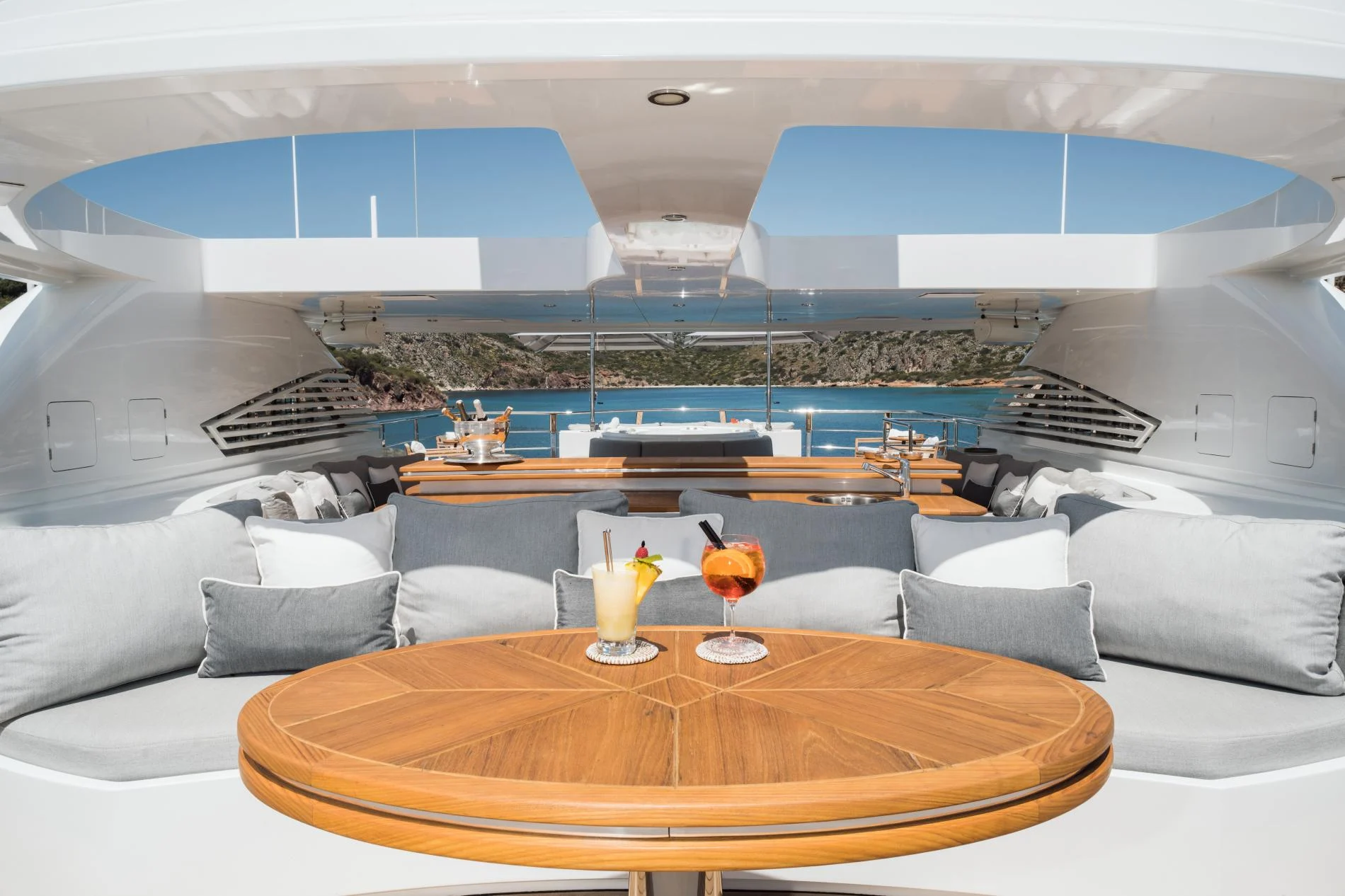 Sky lounge seating with cocktails aboard a 47m luxury superyacht charter Göcek — OS4712