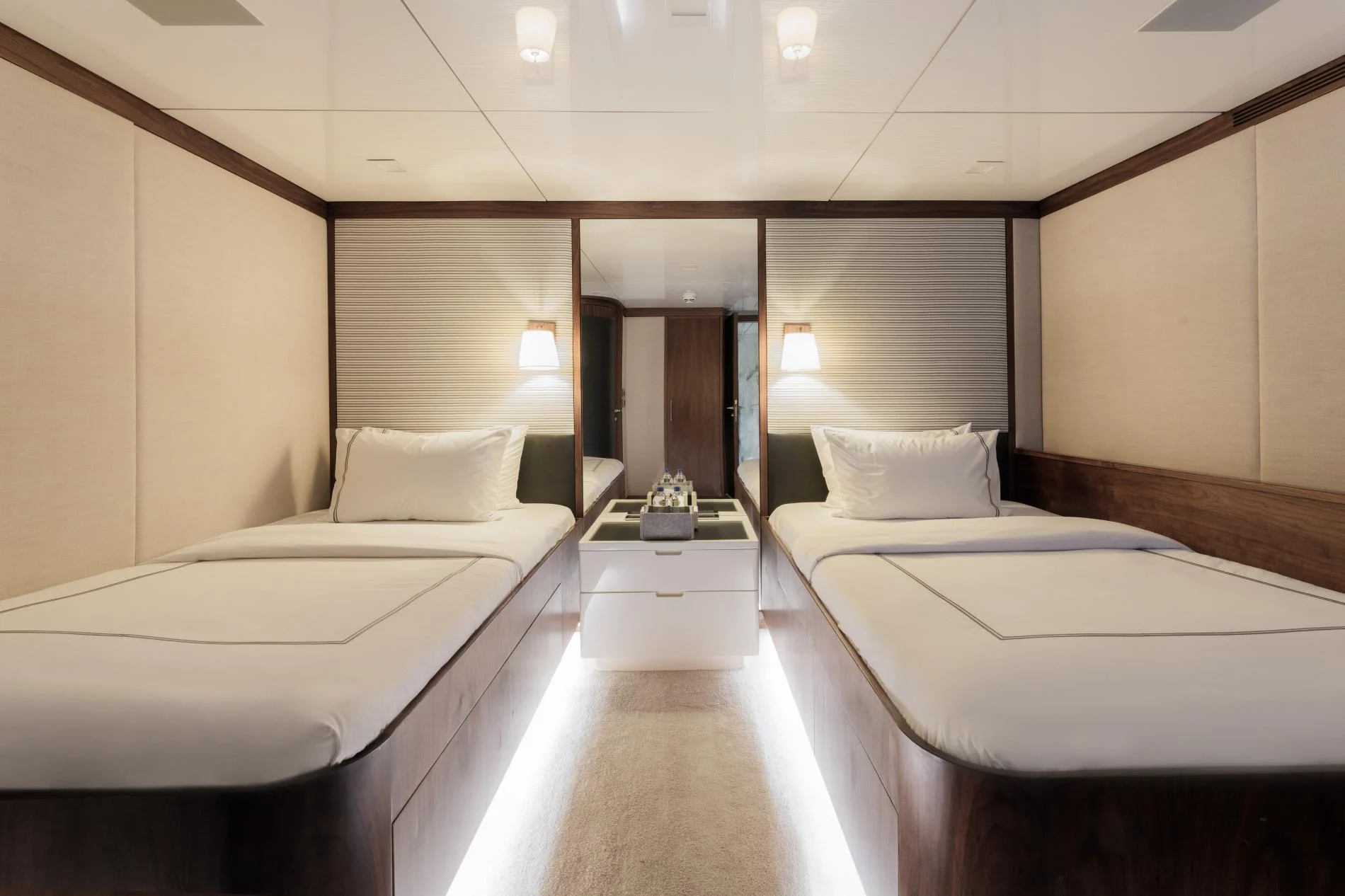 Twin guest cabin in walnut joinery aboard a 47m crewed superyacht charter — OS4712