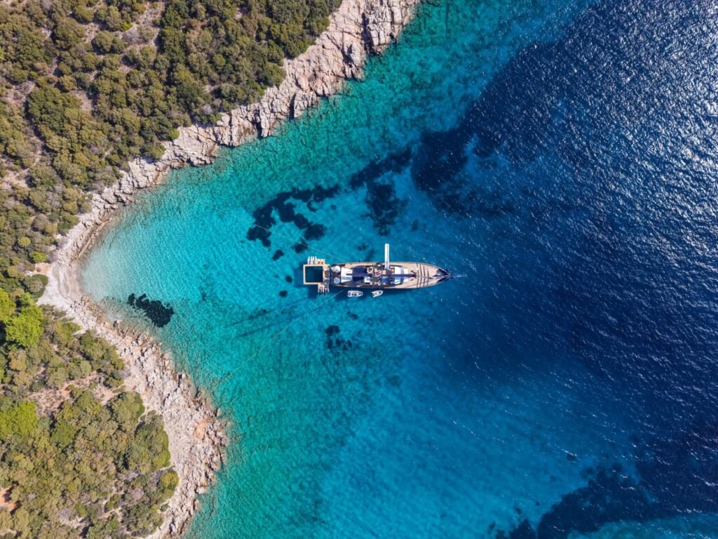 51m Motor Sailer Charter Bodrum OG5005 aerial view at anchor off the Turkish coast