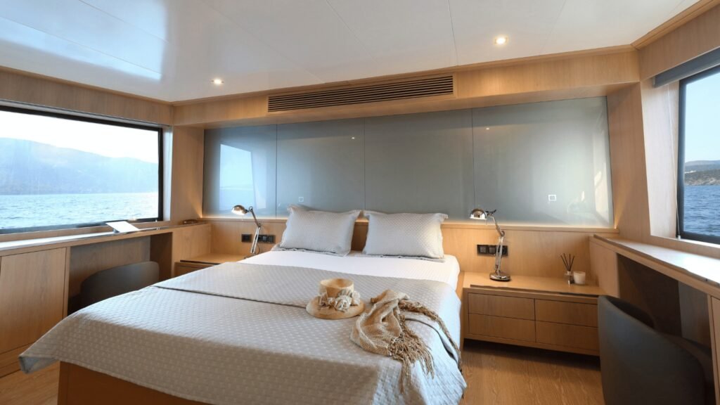 Motor yacht charter Sardinia - full-beam master cabin with panoramic windows aboard Aegean Explorer motor yacht UK2606, Sardinia charter