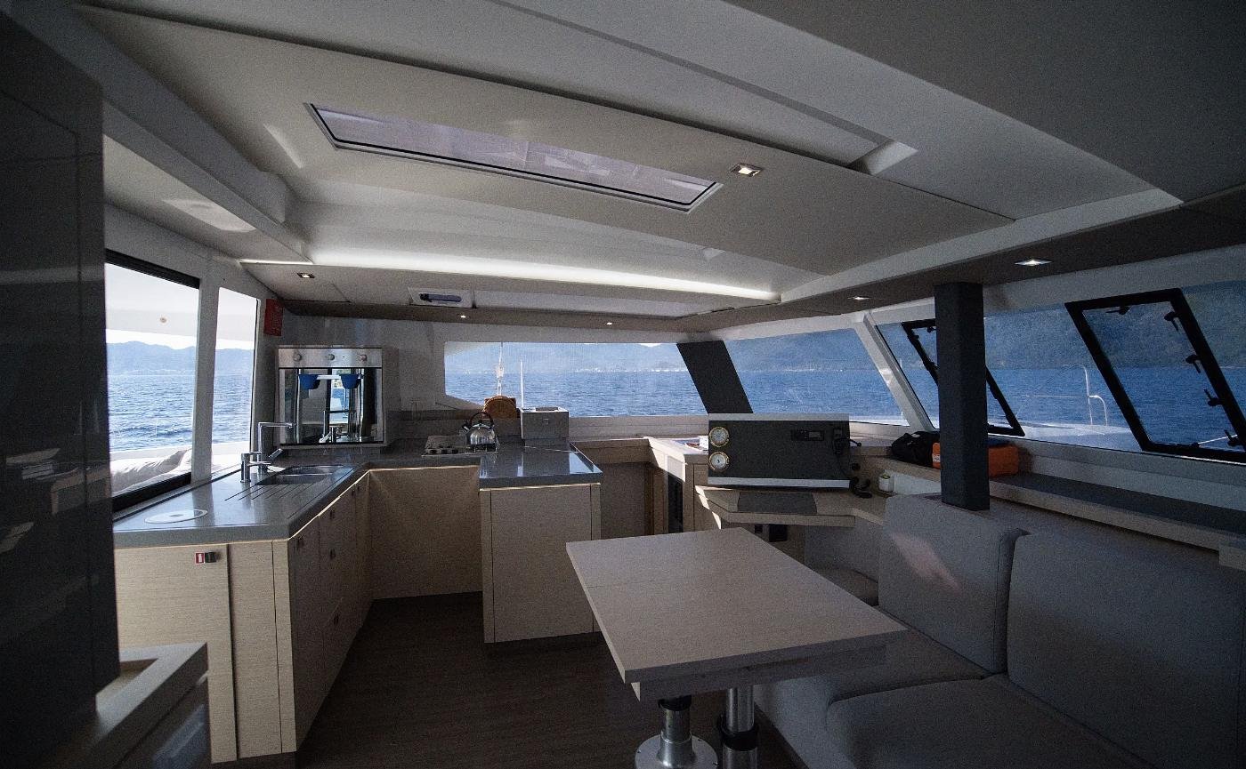 Saloon and galley of the Astrea 42 charter catamaran in Marmaris with panoramic windows