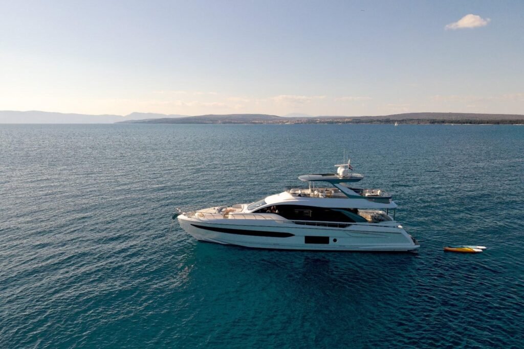 Azimut 78 Fly CO2404 anchored in a quiet Adriatic bay, Croatia crewed charter
