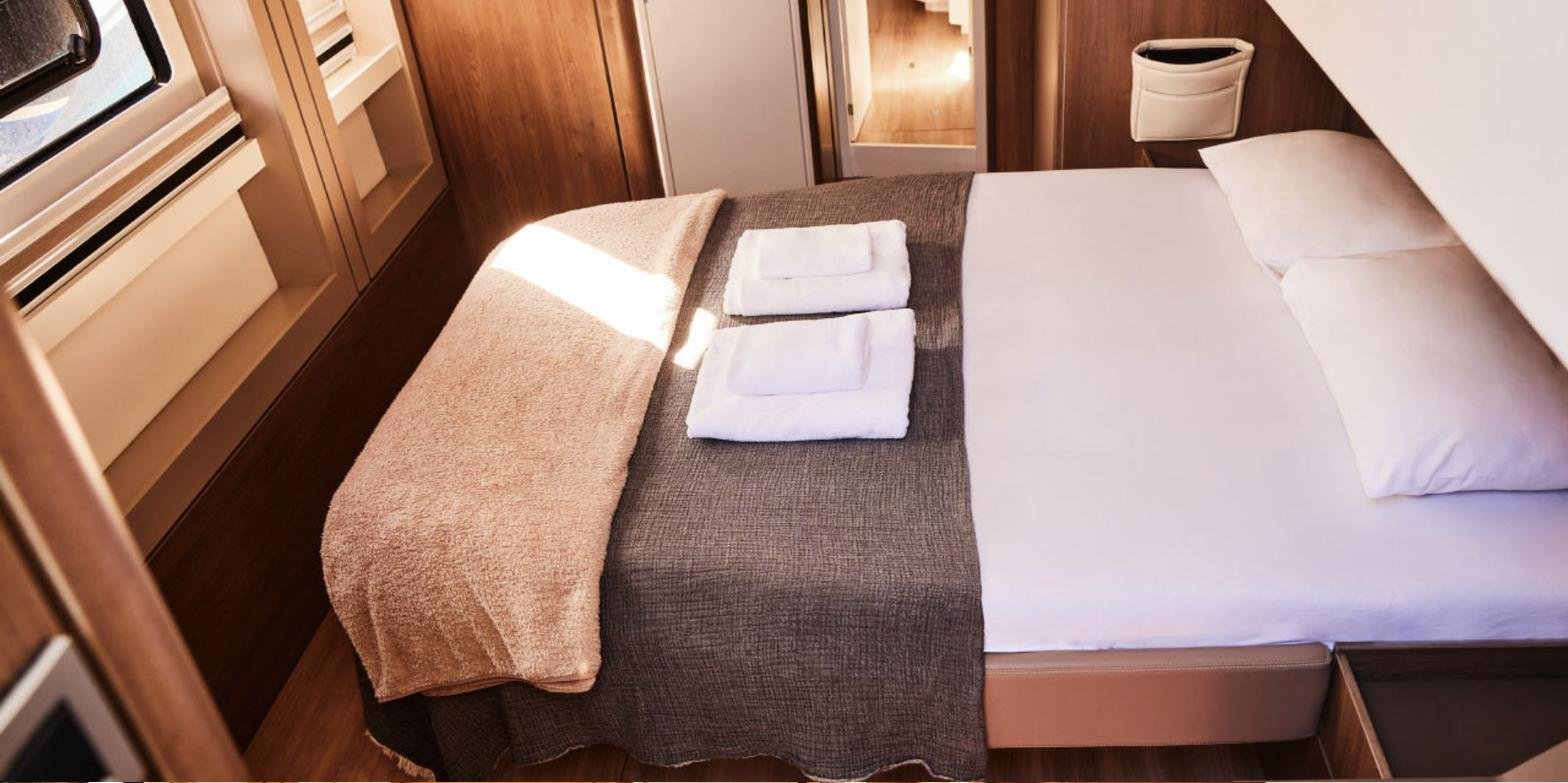 Bali 4.8 charter Marmaris - double guest cabin with fresh linen and a hull window