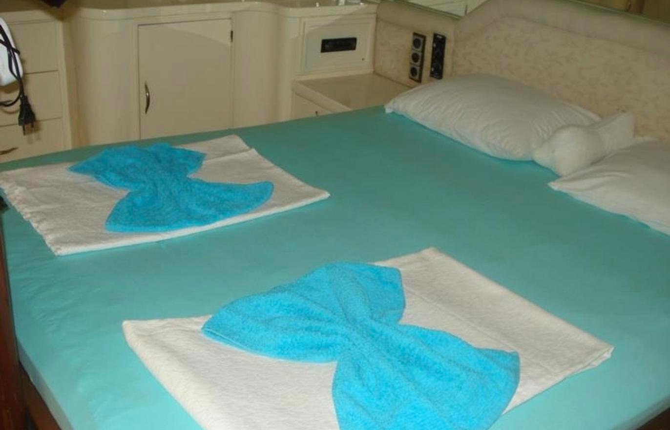 Boutique gulet charter Fethiye - guest double cabin prepared with turndown service