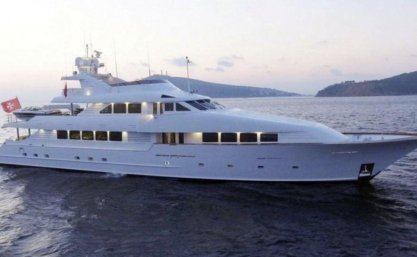 Broward 125 charter Bodrum - 40m motor yacht profile at dusk off the Bodrum peninsula