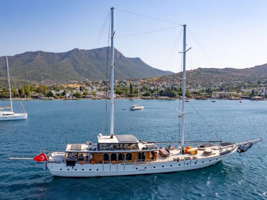 Grand gulet charter Bodrum CA4007 - 40m twin-masted gulet at anchor in the Aegean