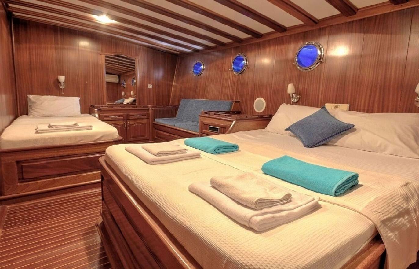 Triple cabin with a double and a single berth on a gulet charter in Fethiye