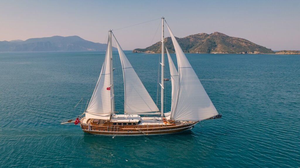 LQ3708 Deluxe Gulet Charter Fethiye sailing past the Turkish coastline
