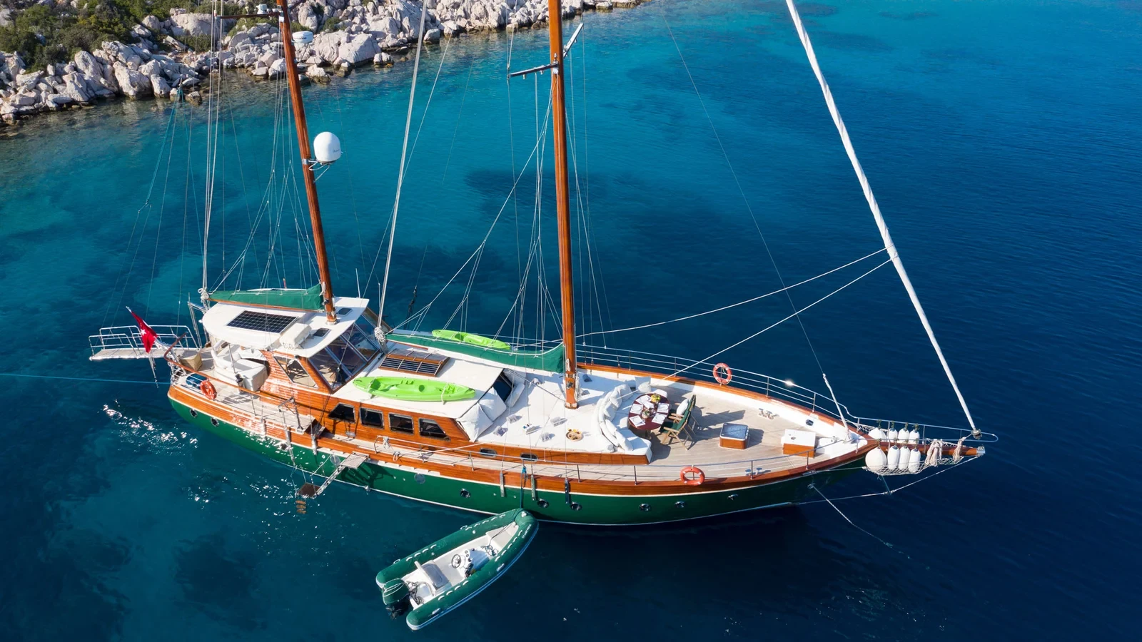 LF2308 23m deluxe gulet charter Rhodes drone birds eye anchored cove